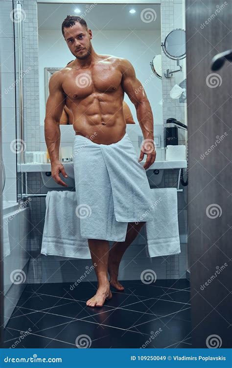 Naked man in bathroom t